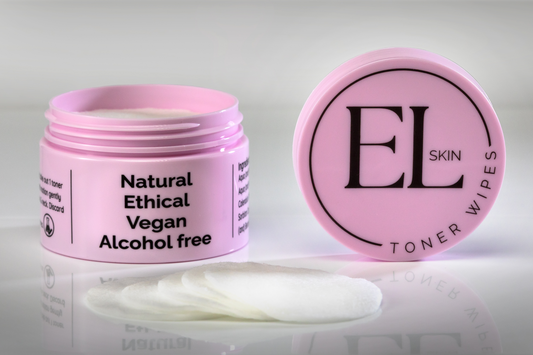 Pink container of EL Skin toner wipes with a lid on a light gray background