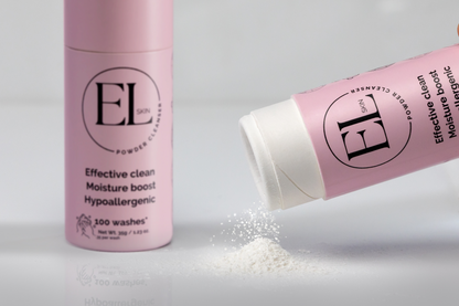 Pink EL powder cleanser with packaging on a light gray background