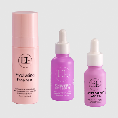 Three skincare products from EL Skin Care on a light gray background