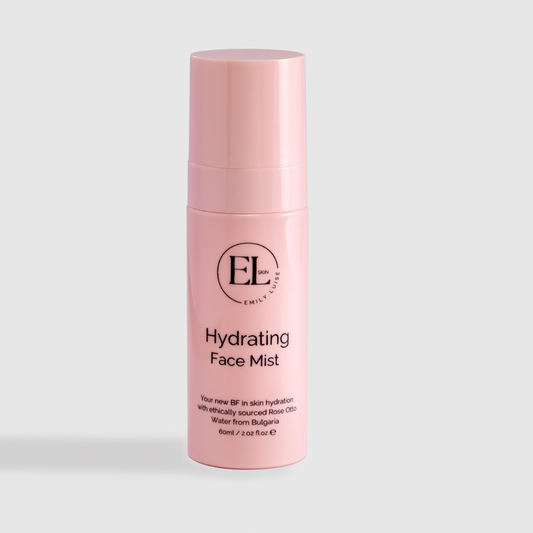Pink hydrating face mist bottle with 'EL' branding on a light gray background